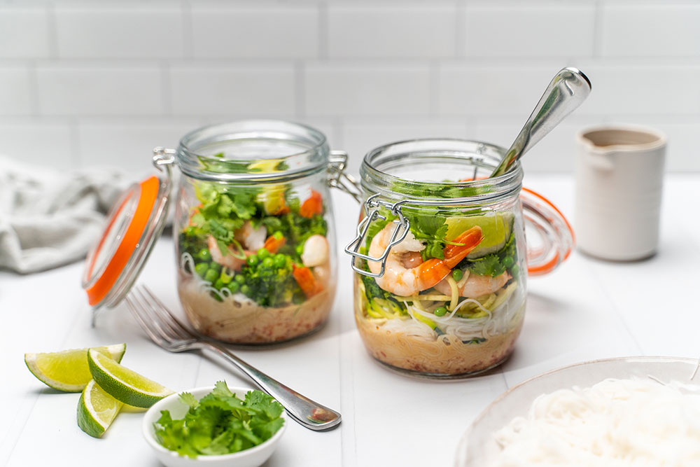 Prawns, vegetables, coriander and rice noodle mason jars with lime and Lee Kum Kee Pho dressing